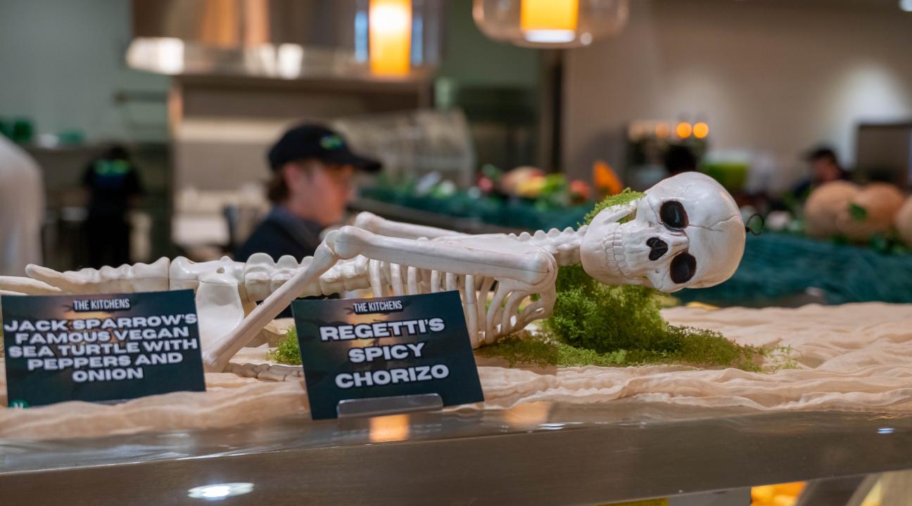 Skeleton laying atop the buffet line