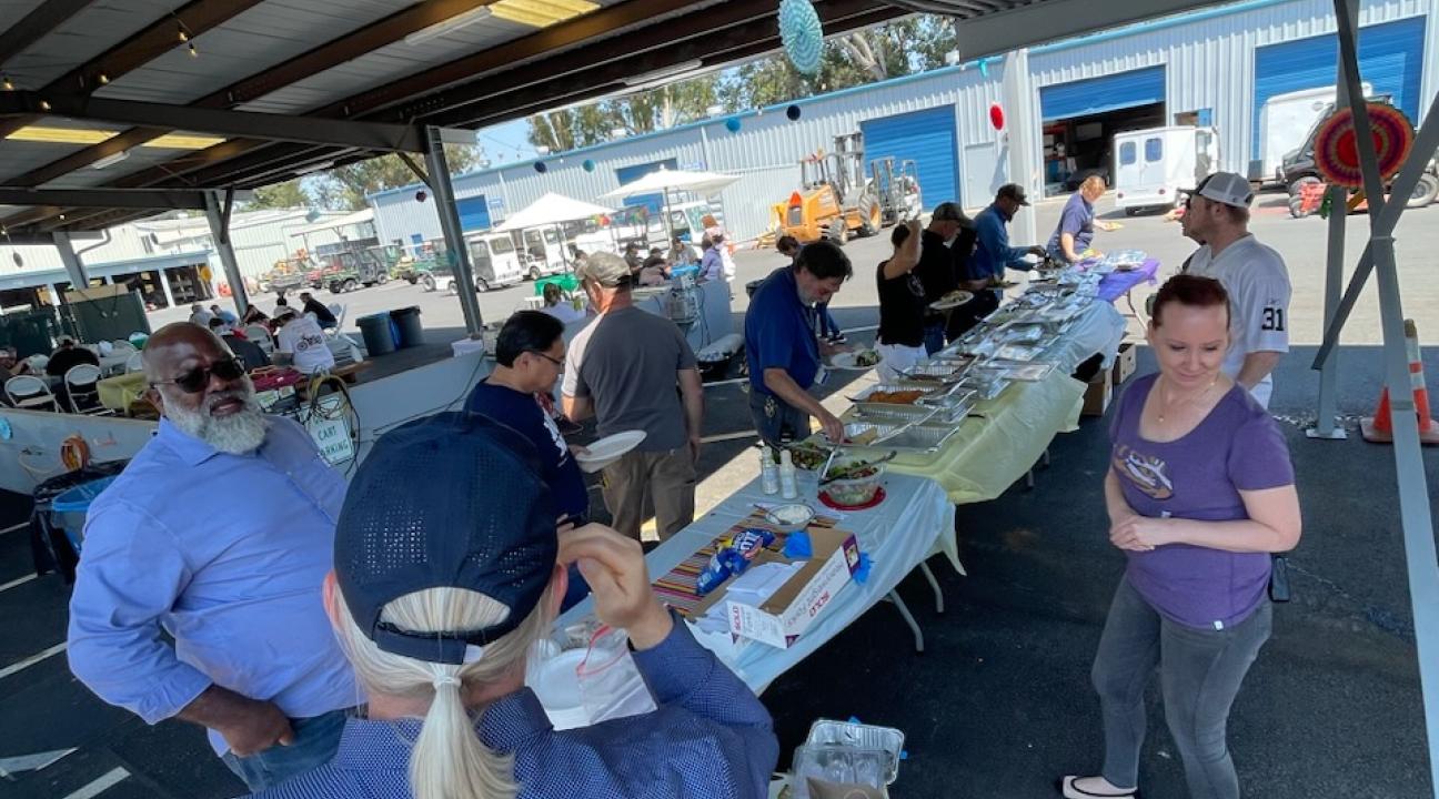 group of people self serving food