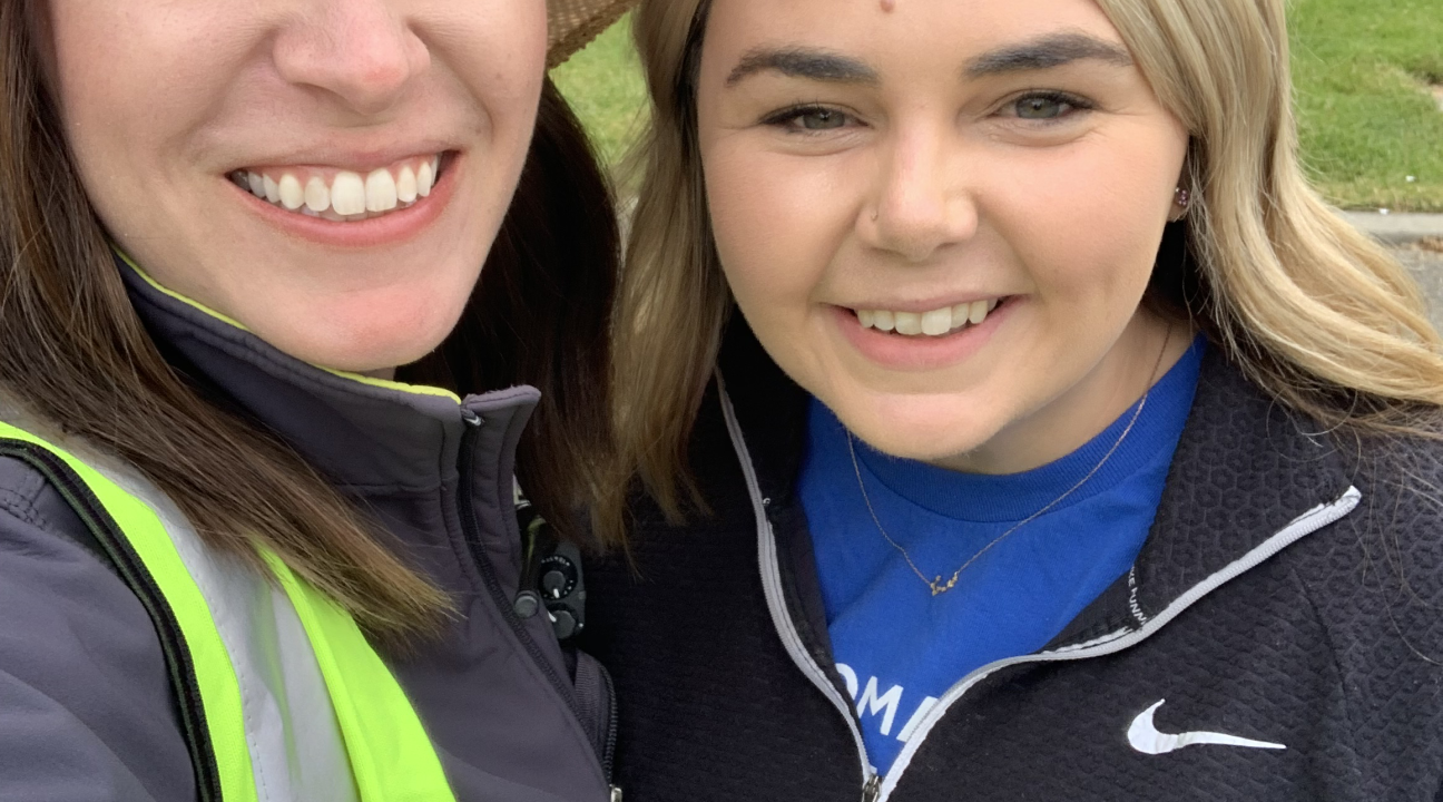 photo of two people standing next to each other