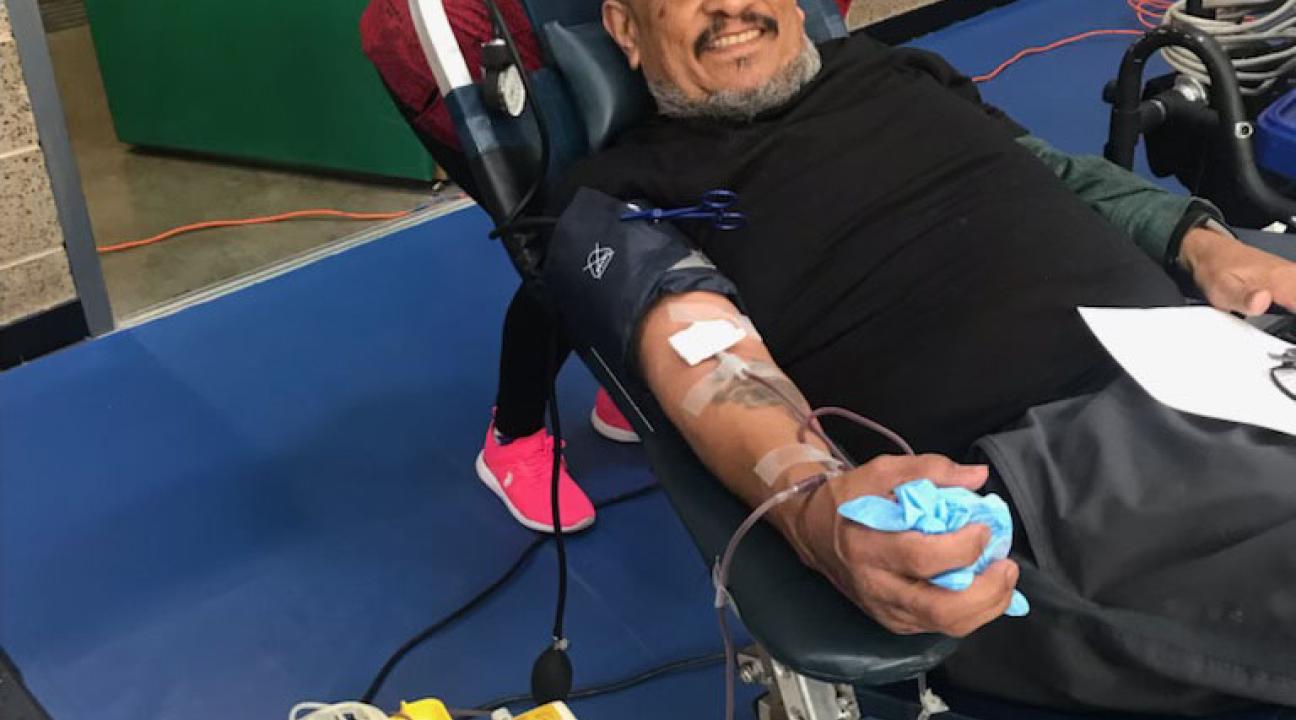 photo of person donating blook