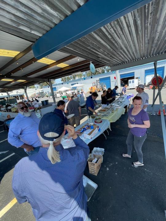 group of people self serving food