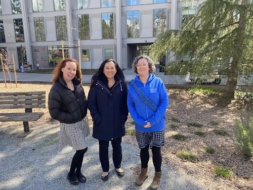 photo of three people outside Stevenson Hall